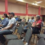 audience at community meeting